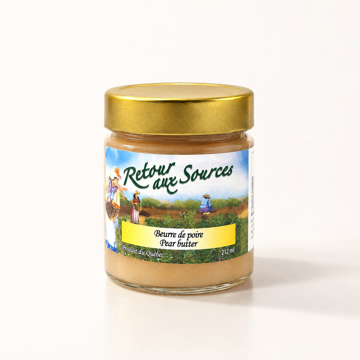 Pot de beurre de poire au couvercle doré de Retour aux Sources sur un fond crème avec ombre douce