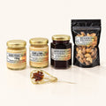 Coffret gourmand à l'érable : beurre d'érable, beurre de pomme, confiture de bleuets, noix à l'érable et suçon