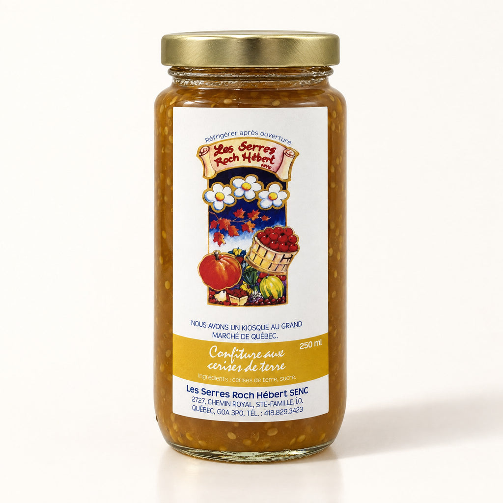 Pot de confiture aux cerises de terre au couvercle doré, présenté debout sur un fond crème épuré
