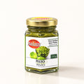 Pot en verre de pesto aux fines herbes Balatti avec son couvercle doré, présenté sur un fond crème uni